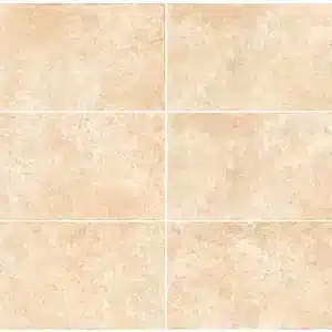 Gros plan sur le carrelage pierre naturelle Roma Gold 31x62 cm, finition naturelle beige doré aux nuances chaleureuses et minérales.